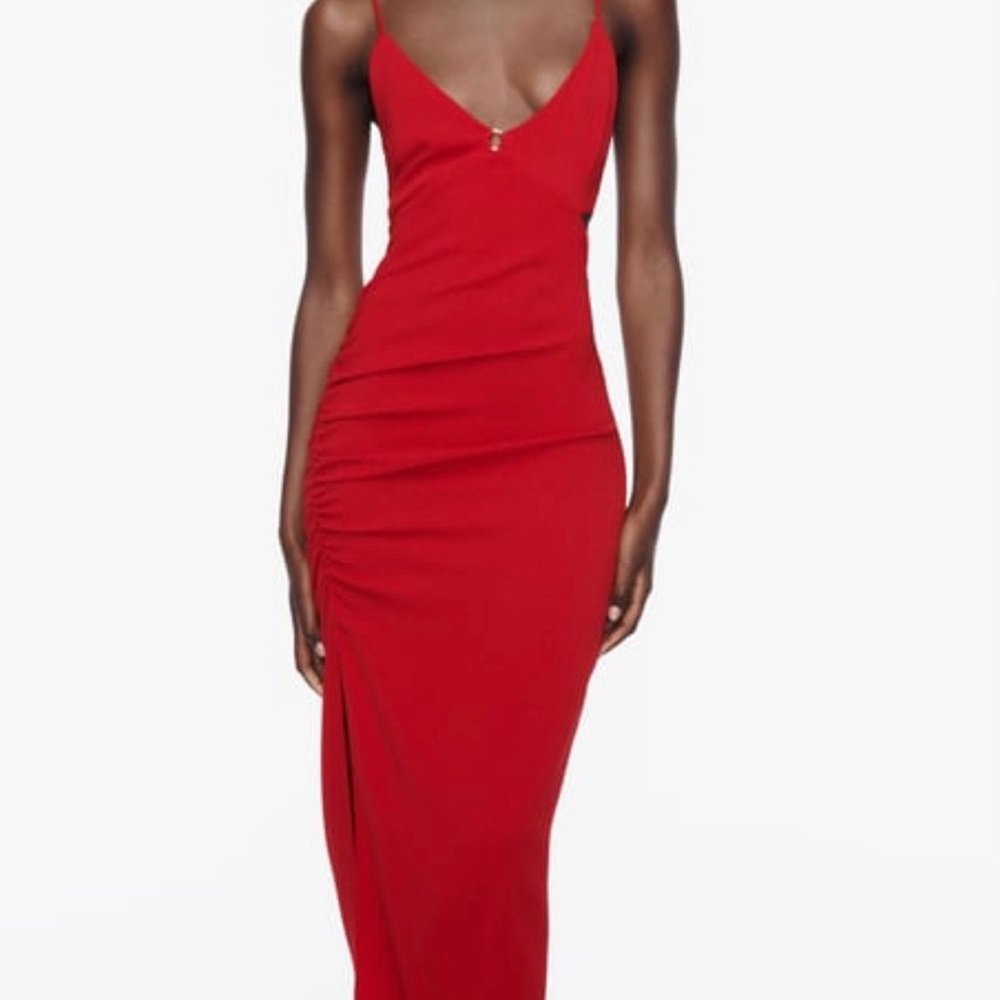 Midi dress with V-neckline and spaghetti straps.